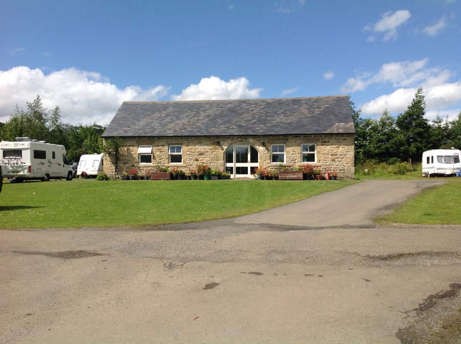 Reception and amenities block at Wellhouse Farm Caravaning & Camping Park, Stocksfield, Northumberland, UK